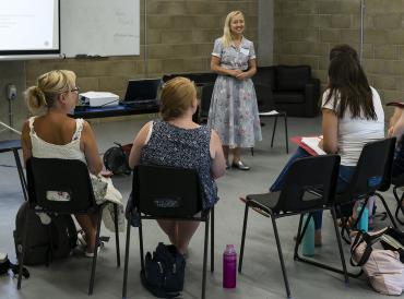 Participants sitting in a circle during a 2018 LAMDA exams summer workshop