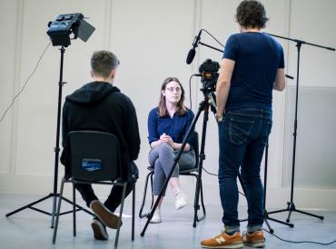 A LAMDA short course student with a camera