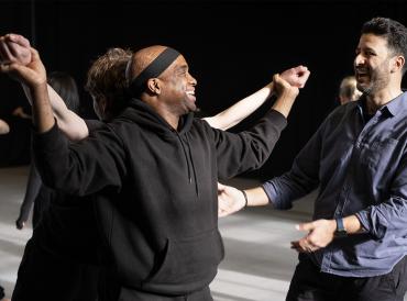 A tutor and student in a movement class