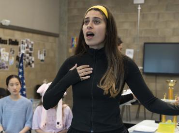 A LAMDA student singing in rehearsals