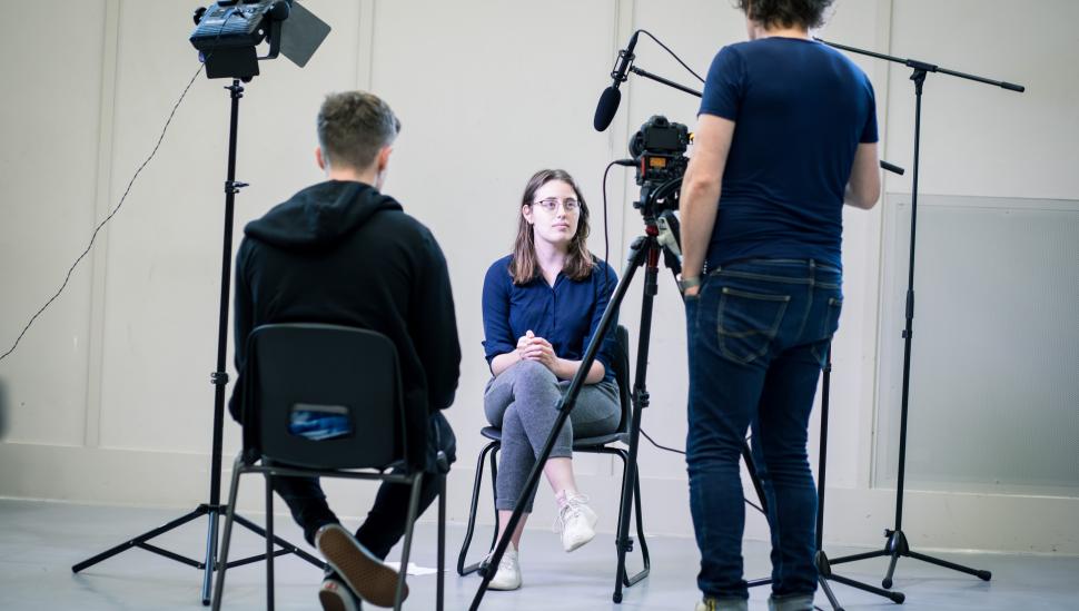 A LAMDA short course student with a camera